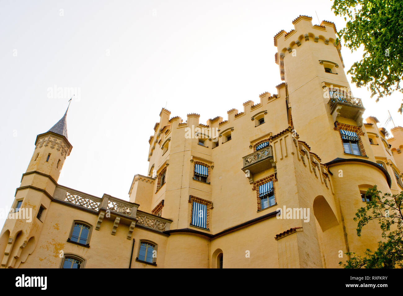 Towers and parapets on castle walls at Hohenschwangau Castle in Bavaria ...