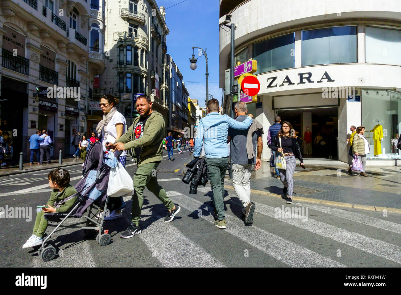 Valencia, people on Carrer de Colón in front of Zara Store, Spain Stock Photo