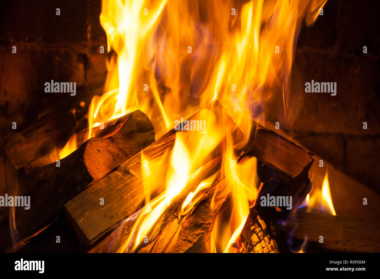Wood Burning In A Cozy Fireplace At Home Keep Warm Stock Photo