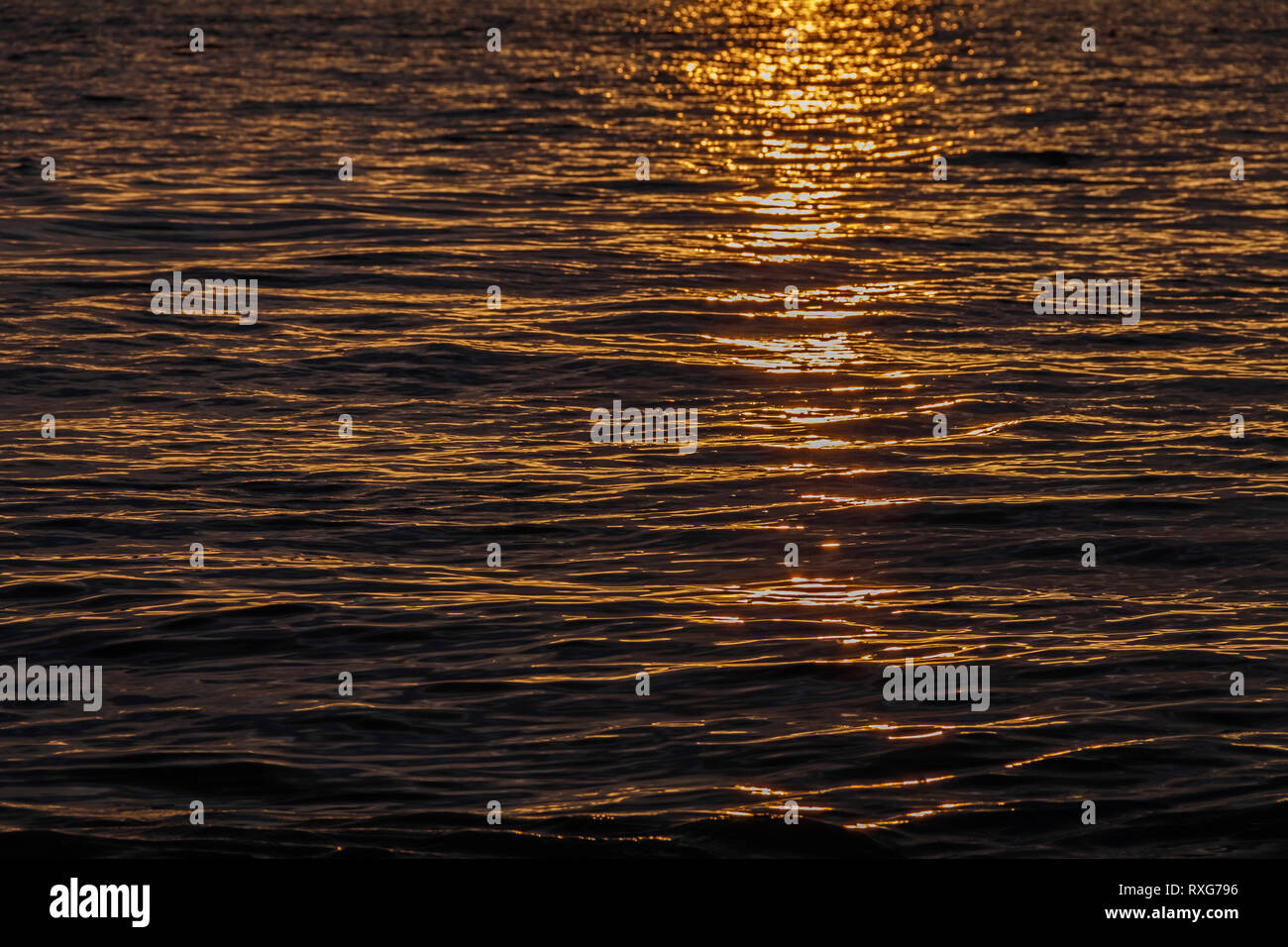 Sunlight reflecting onto the sea Stock Photo