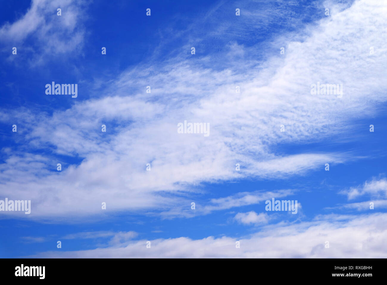 Vivid blue sky with pure white clouds on sunny day Stock Photo - Alamy