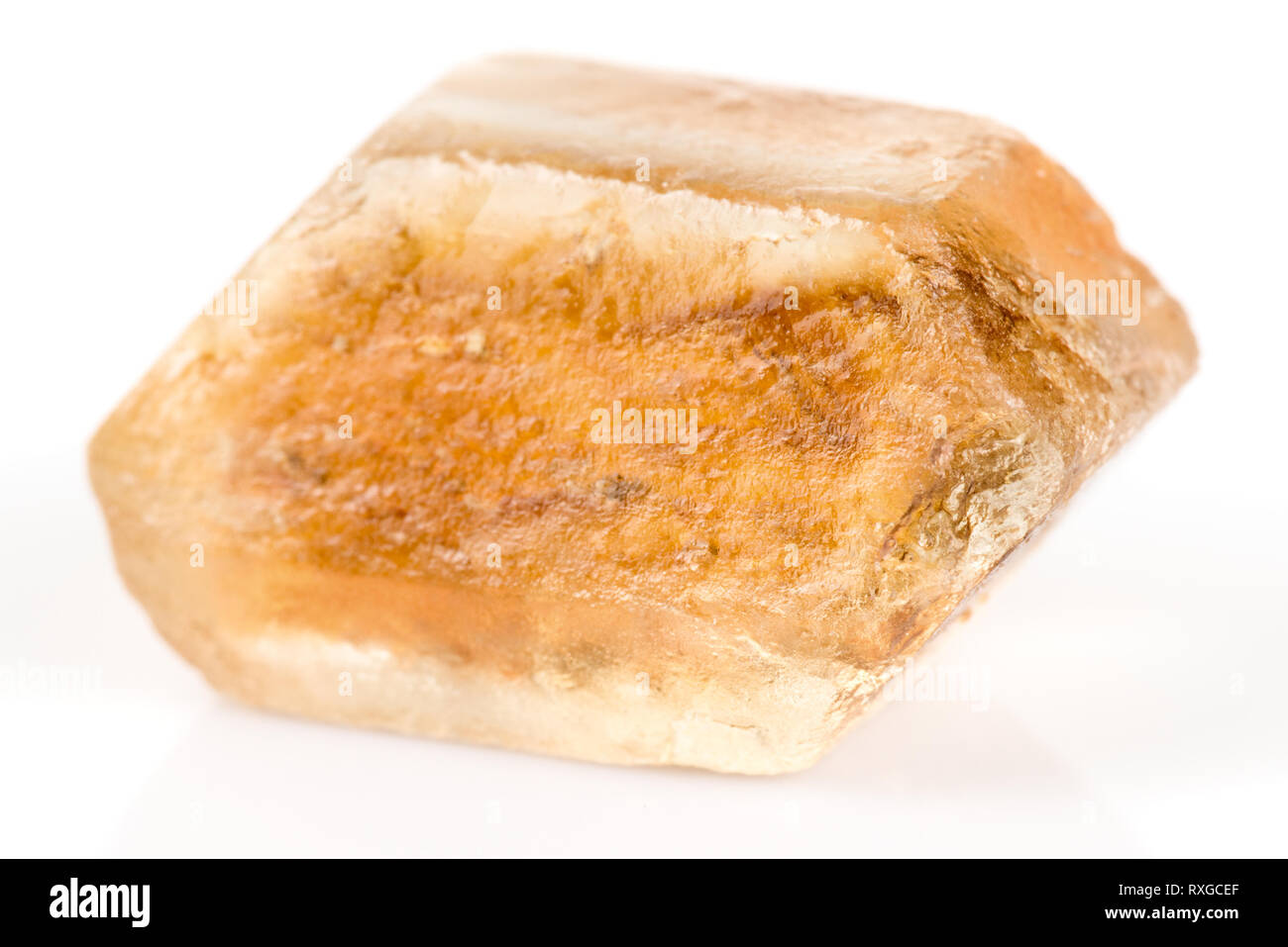 Crystal of sugar - one on most dangerous materials in world. Isolated with reflection and shadow Stock Photo