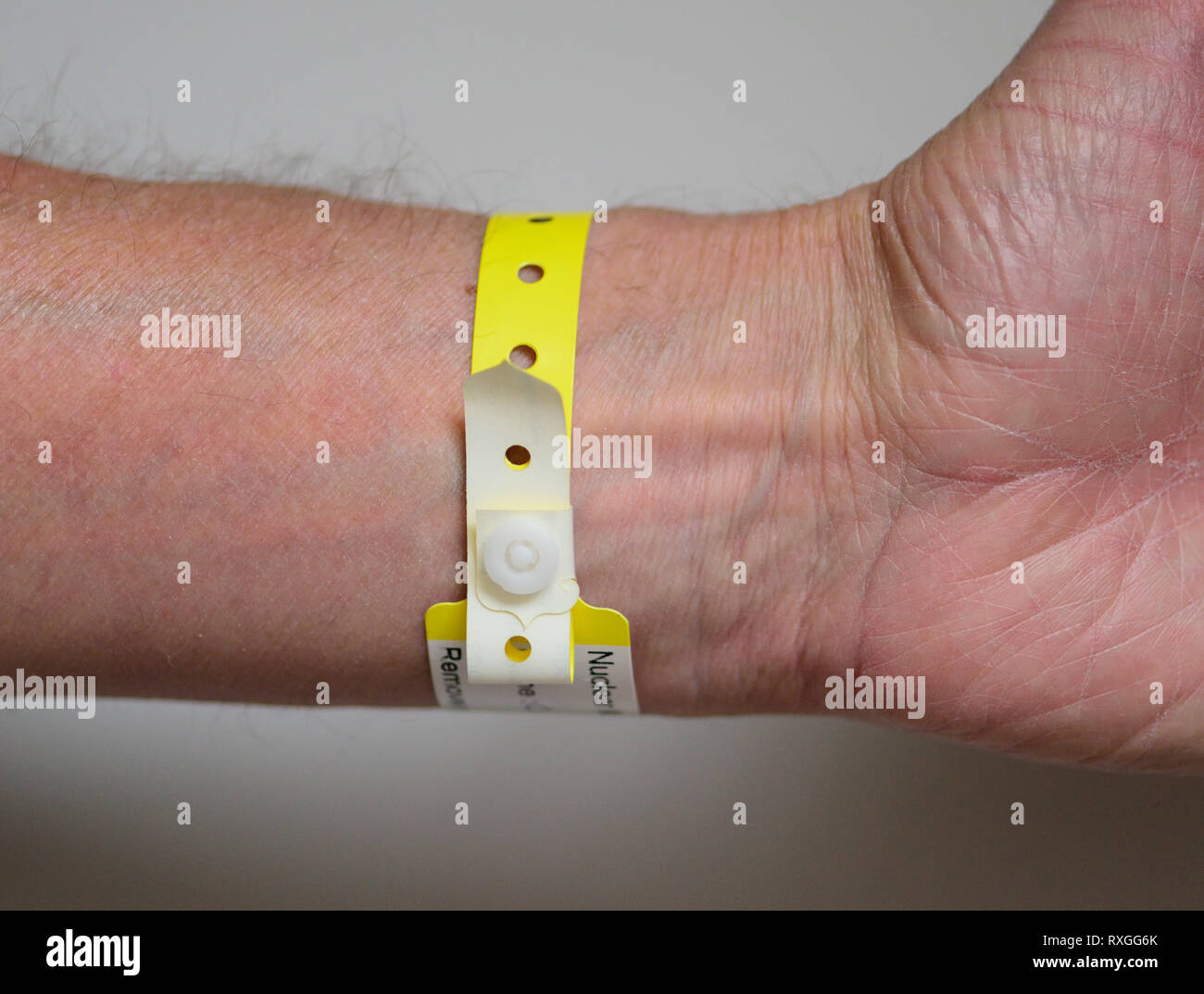 A plastic wristband worn by a hospital patient Stock Photo Alamy