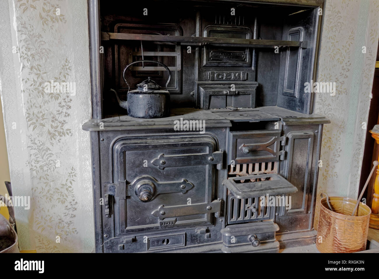 An old kitchen cooking range in a house in the Highland Folk Museum at Newtonmore, Scotland. Stock Photo