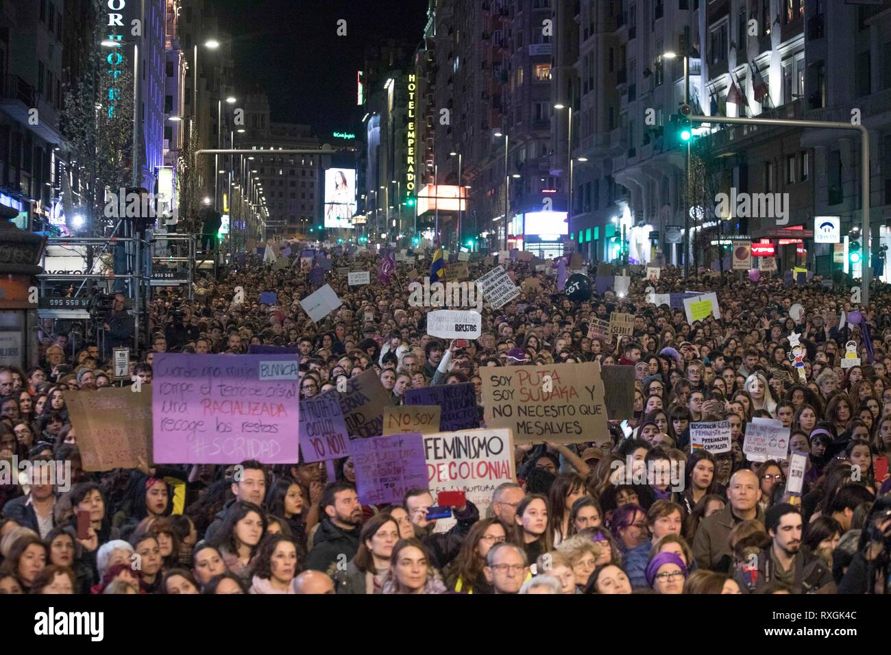 Protesters are seen holding placards during the demonstration. Feminist protest demanding for women rights during the International Women's Day in Madrid. According to the authorities, the estimation of more than 350,000 people have participated in the protest. Stock Photo