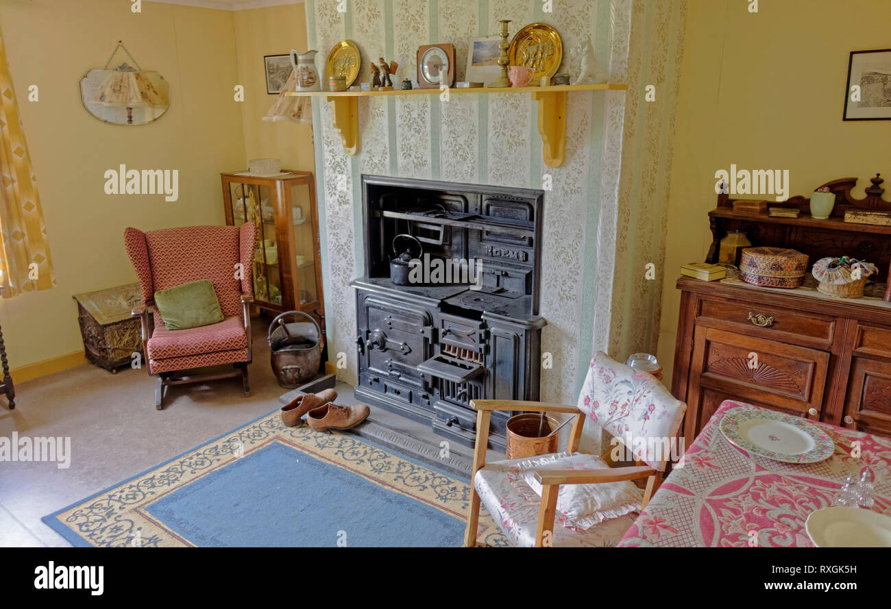 A living room in a house in the Highland Folk Museum at Newtonmore, Scotland. It is interpreted for the 1950s. Stock Photo
