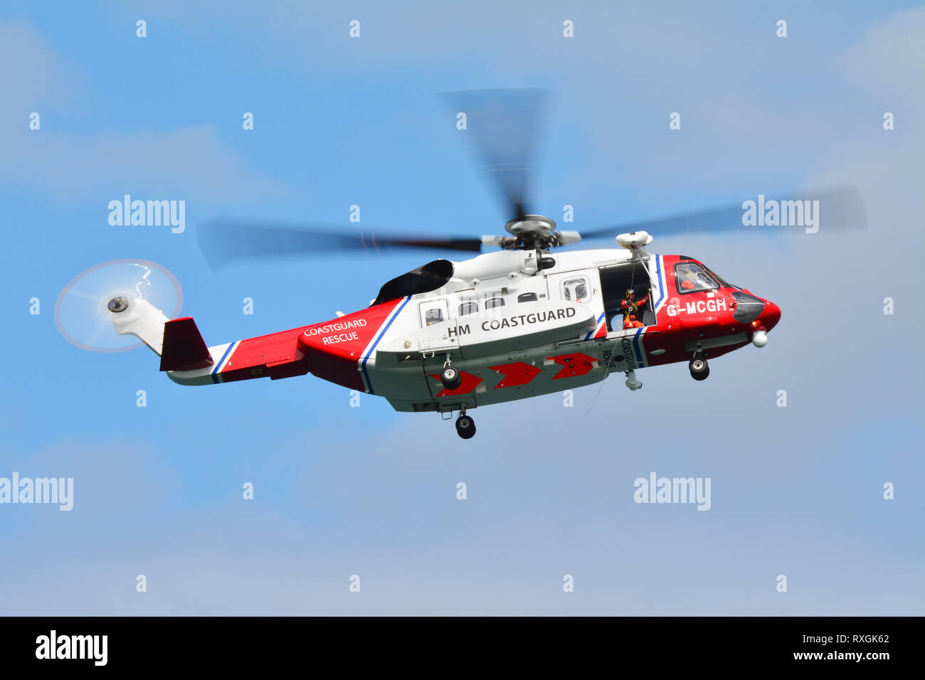 Coast Guard Helicopter. The rescue operation on the sea Stock Photo