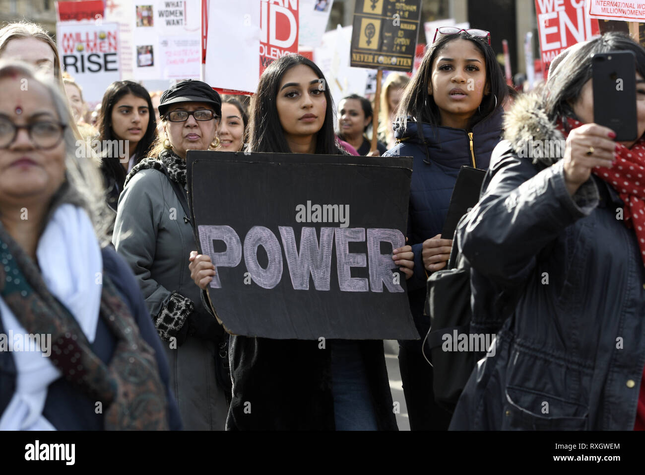 London, Greater London, UK. 9th Mar, 2019. A woman seen holding a placard during the Million Women's Rise march in London.Thousands of women marched through central London to a rally in Trafalgar Square in London demanding freedom and justice and the end of male violence against them. ''˜Never Forgotten' was the theme for this year's march and participants commemorated the lives of girls and women who have been killed by mens's violence. Credit: Andres Pantoja/SOPA Images/ZUMA Wire/Alamy Live News Stock Photo