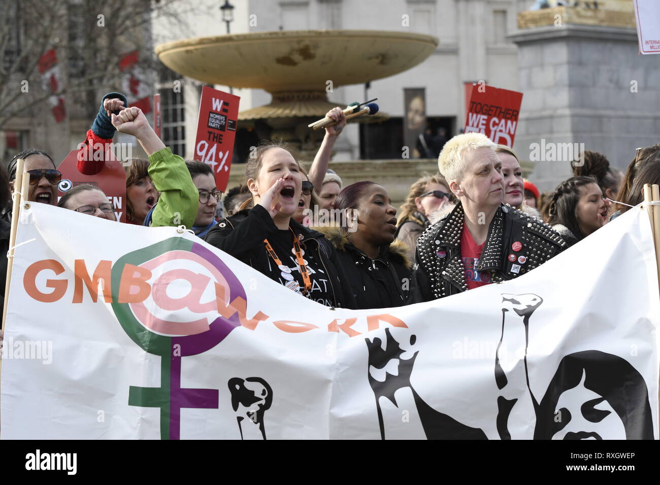 London, Greater London, UK. 9th Mar, 2019. Women seen shouting slogans while holding a large banner during the Million women's rise march in London.Thousands of women marched through central London to a rally in Trafalgar Square in London demanding freedom and justice and the end of male violence against them. ''˜Never Forgotten' was the theme for this year's march and participants commemorated the lives of girls and women who have been killed by mens's violence. Credit: Andres Pantoja/SOPA Images/ZUMA Wire/Alamy Live News Stock Photo