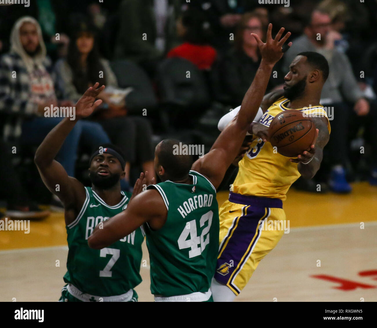 Los Angeles Lakers forward LeBron James #23 passing in traffic during the Boston Celtics vs Los Angeles Lakers game at Staples Center in Los Angeles, CA on March 09, 2019. (Photo by Jevone Moore) Stock Photo