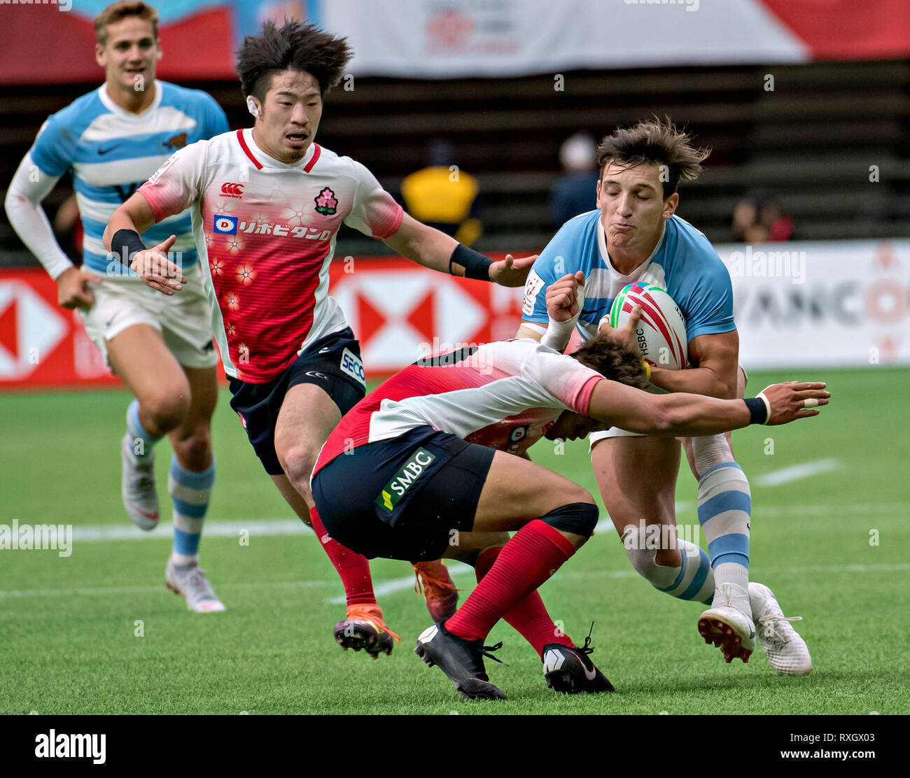 Vancouver, Canada. 9th Mar, 2019. Luciano Gonzalez (1st R) of Argentina vies with Taiki Koyama (2nd L) and Kazuhiro Goya (2nd R) of Japan during the HSBC World Rugby Seven Series at BC Place in Vancouver, Canada, March 9, 2019. Credit: Andrew Soong/Xinhua/Alamy Live News Stock Photo
