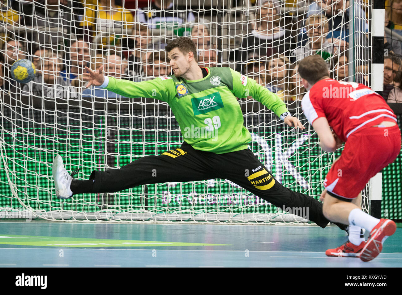 Dusseldorf, Germany. 9th March 2019. Handball: International match, Germany - Switzerland in the ISS Dome. Germany's Christopher Rudeck (l) and Switzerland's Marvin Lier fight for the ball. Photo: Federico Gambarini/dpa Credit: dpa picture alliance/Alamy Live News Stock Photo