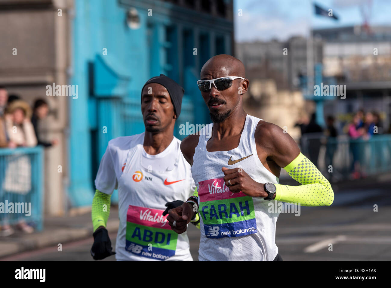 Mo Farah and Bashir Abdi running in the Vitality Big Half half marathon crossing Tower Bridge, London, UK. Stock Photo