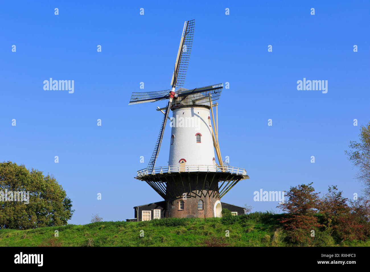The round brick grist mill (De Koe - The Cow) from 1907 in Veere Netherlands on a beautiful day in autumn Stock Photo