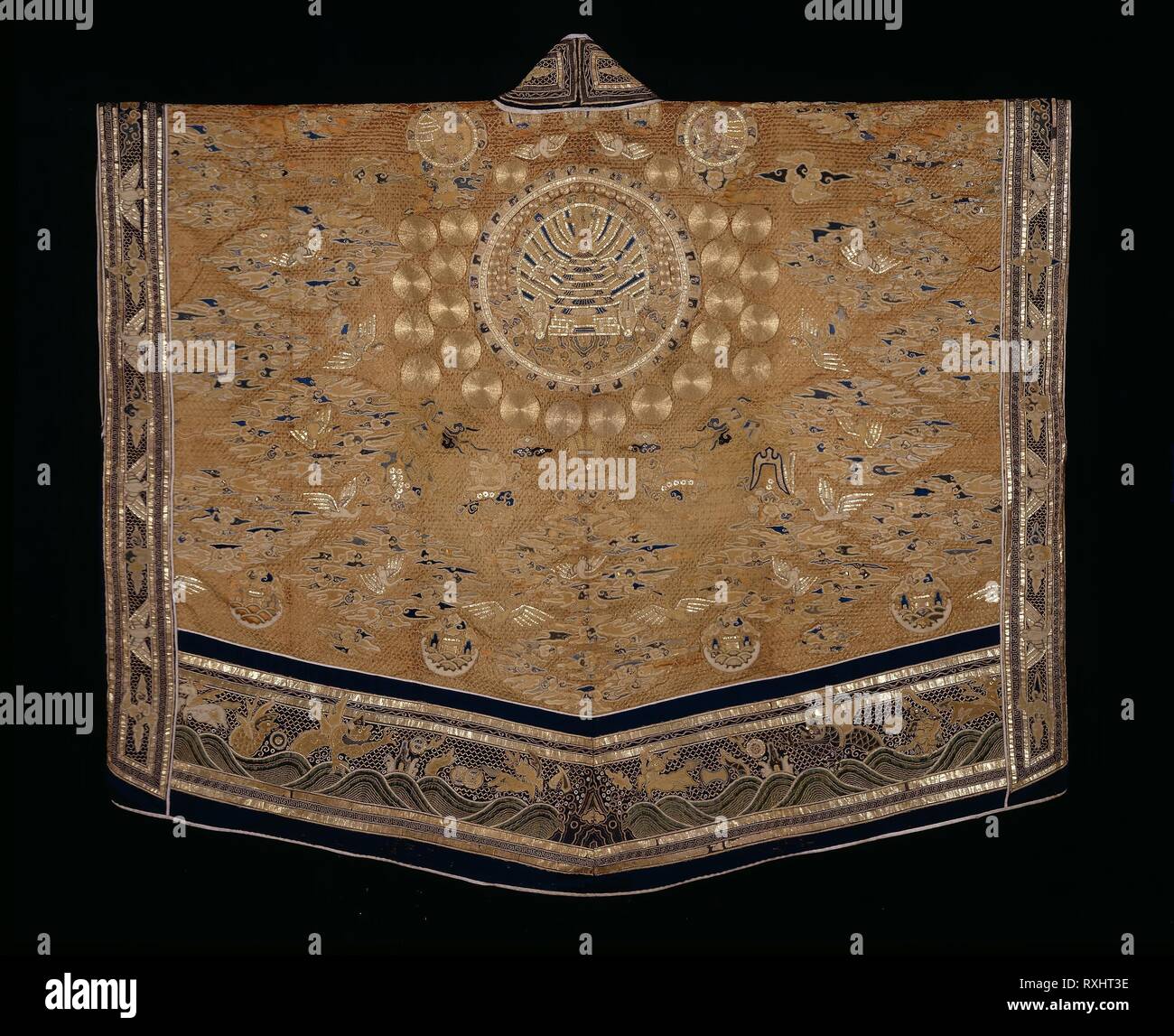 Vestment (For a First-degree Taoist Priest). Zheng Wuda? (Hui- chang, active c. 1793); Han-Chinese; China. Date: 1793. Dimensions: 139.6 × 156.2 cm (55 × 61 1/2 in.). Silk, warp-float faced 7:1 satin weave; embroidered with silk, peacock-feather-wrapped silk, gold-leaf-over-lacquered-paper-strip-wrapped silk, and gold-leaf-over-lacquered paper in surface satin stitches; laid work and couching; appliquéd with forms of silk, plain weaves between two layers of paper, some with gold- and silver-leaf-over-lacquered paper, and embroidered with silk in chain and knot stitches, needle looping with lai Stock Photo