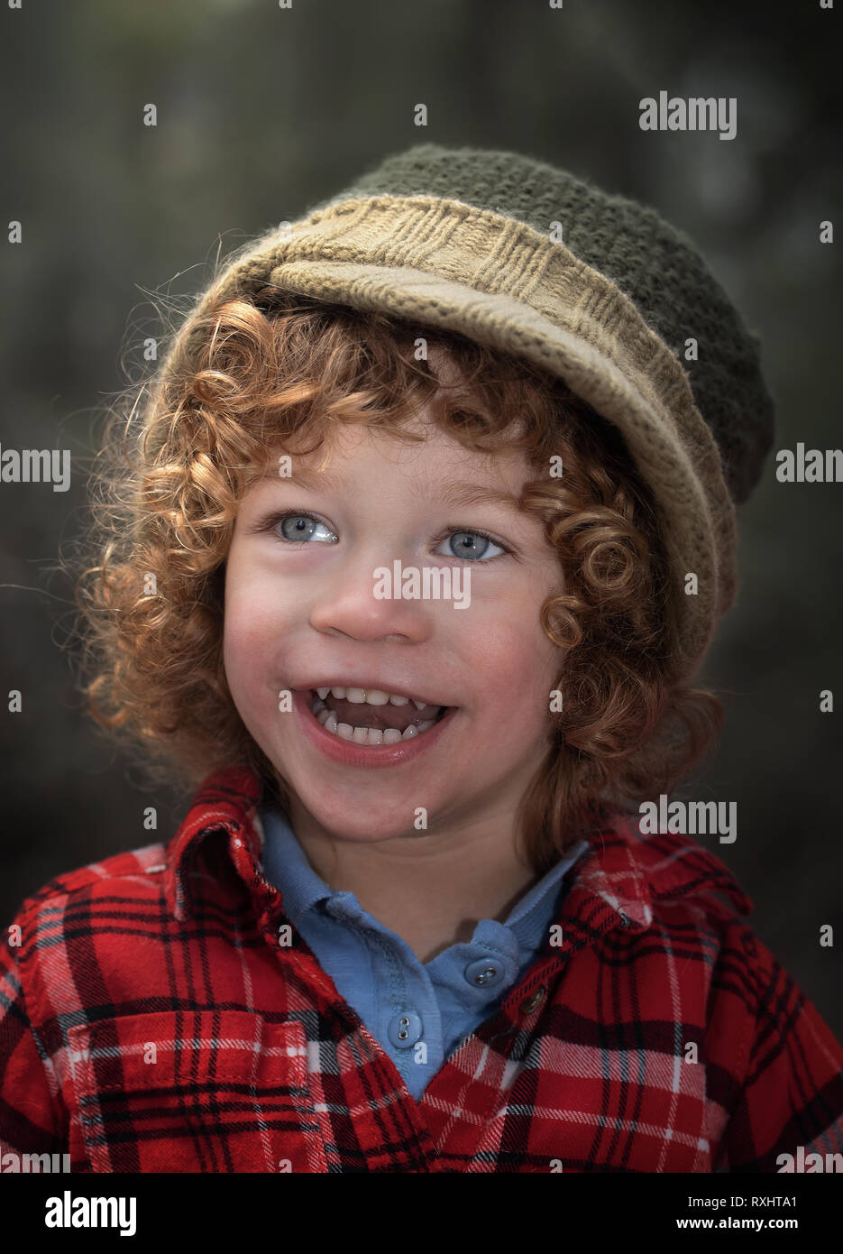 Curly hair cute 3 years old kid Stock Photo