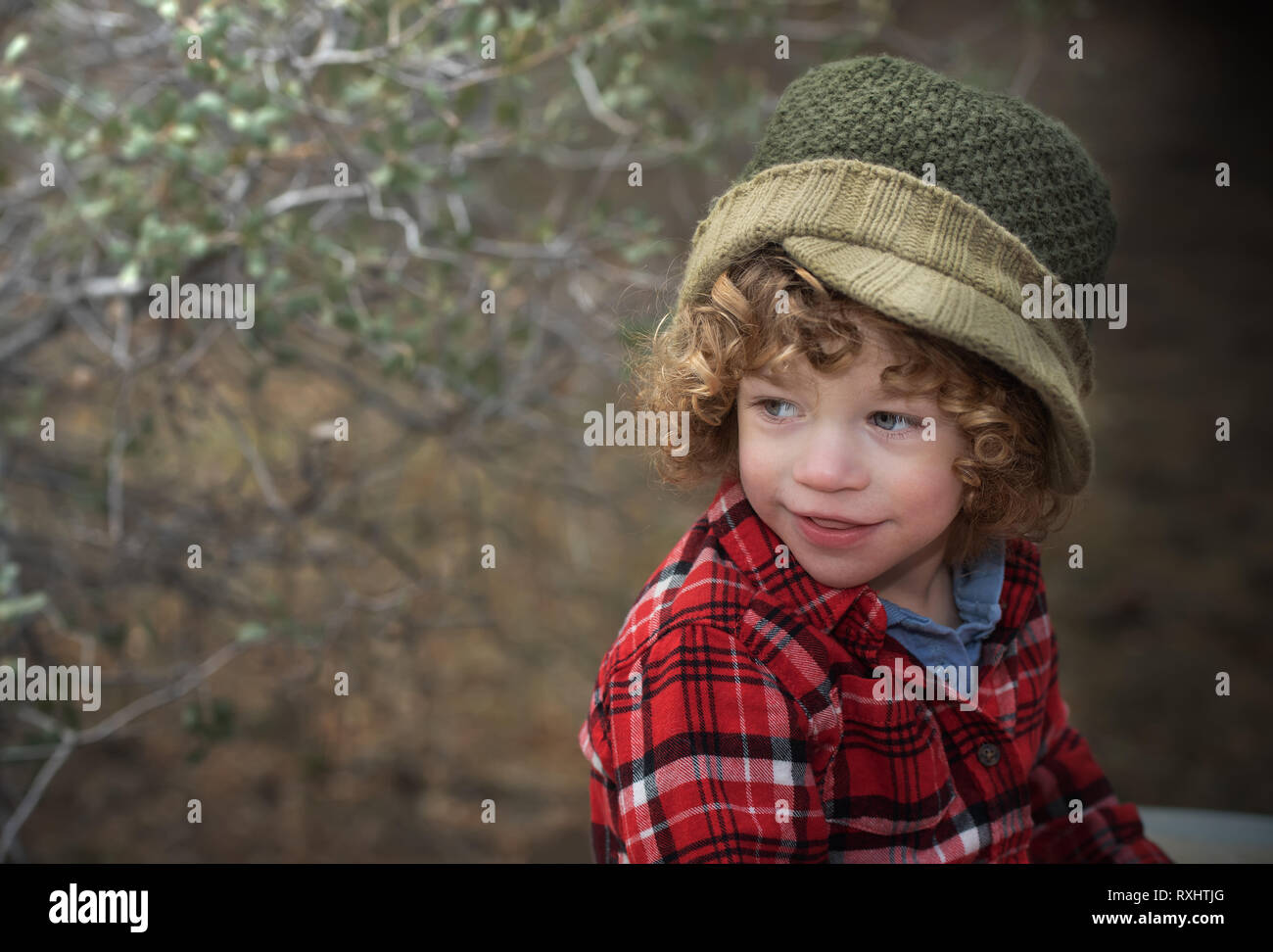 Curly hair cute 3 years old kid Stock Photo