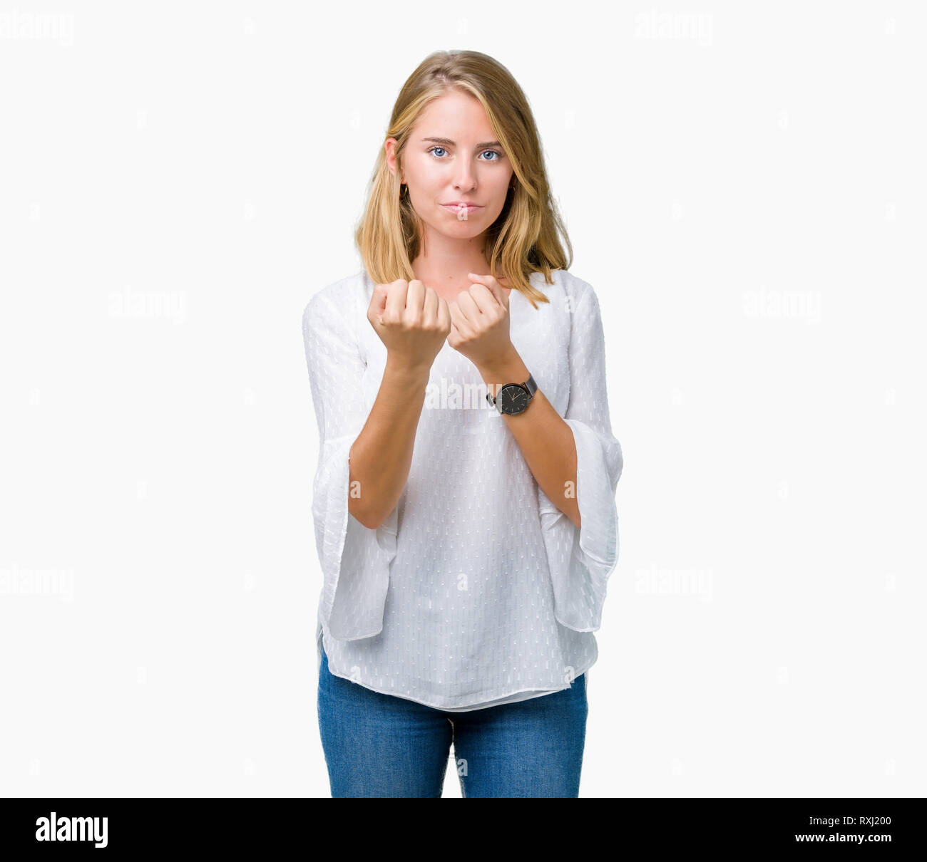 Scared To Fight Beautiful young elegant woman over isolated background Ready to fight ...
