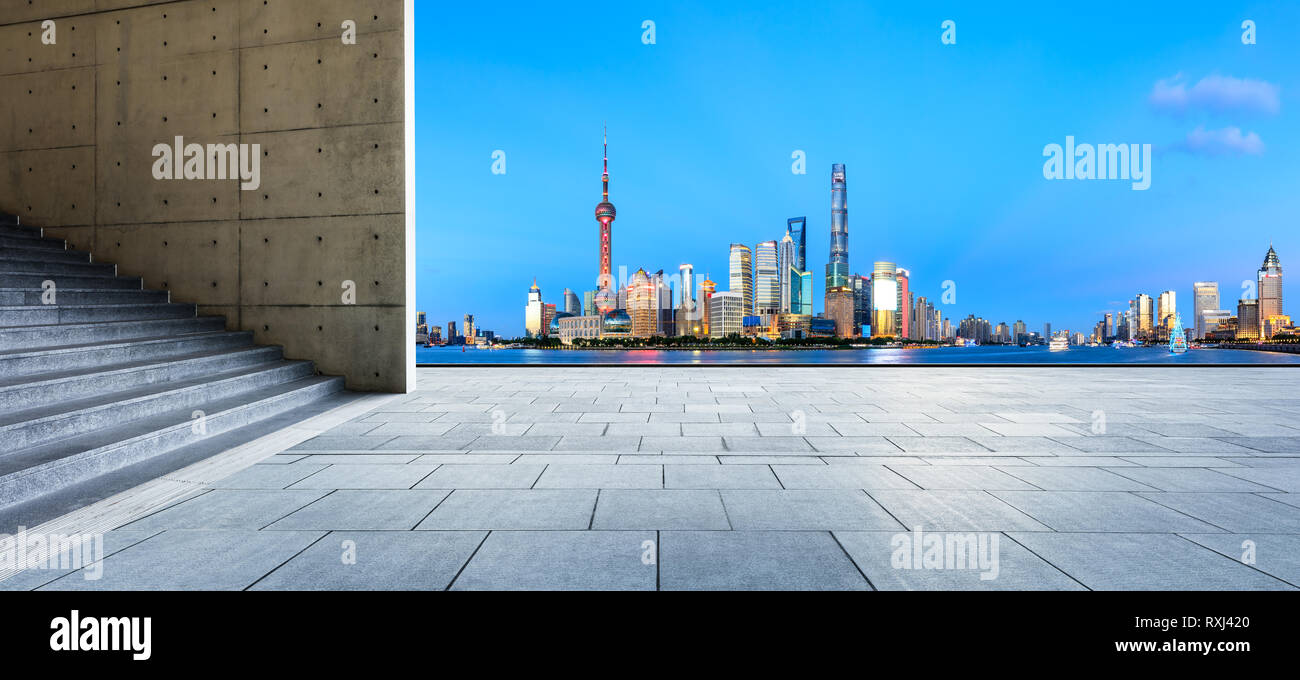 Empty square floor with panoramic city skyline in shanghai at night,China Stock Photo