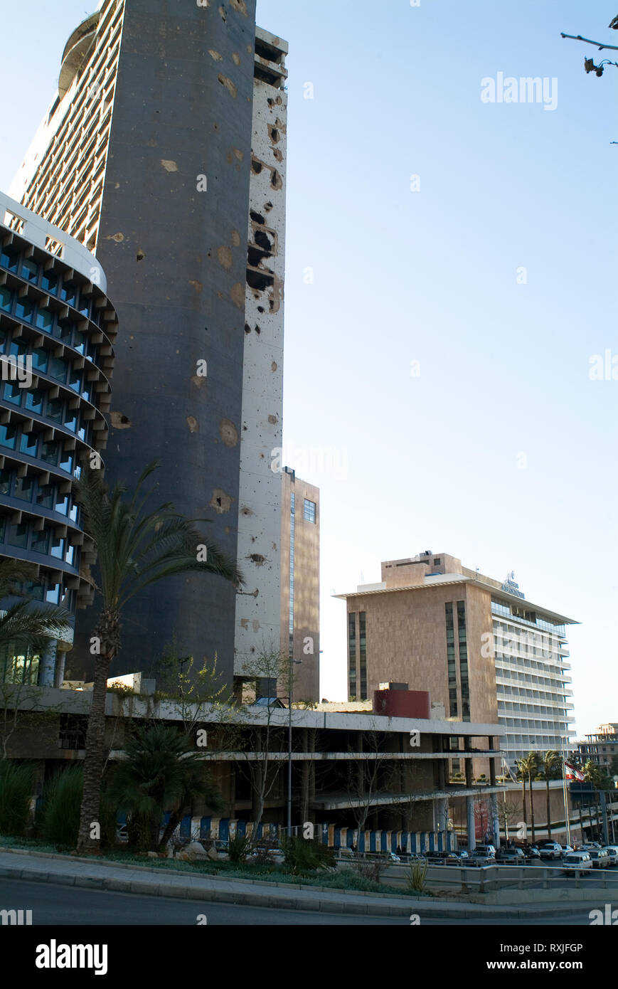 The war-ravaged shell of the former Holiday Inn in Beirut. Opened just before the start of Lebanon's civil war, it soon became a popular spot for snip Stock Photo