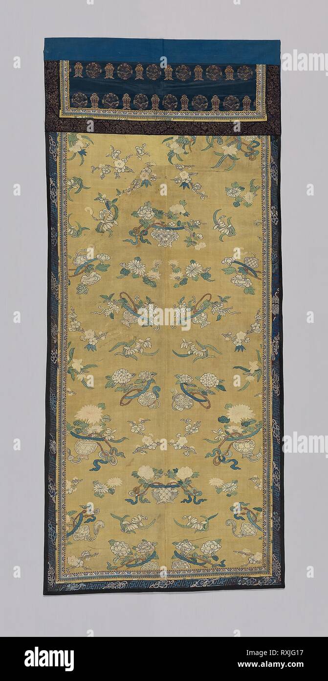 Panel. Manchu; China. Date: 1775-1800. Dimensions: 167 × 73.8 cm (65 3/4 × 29 in.). Center: silk and gold-leaf-over-lacquered-paper-strip-wrapped silk, slit tapestry weave (kossu); painted; inner tape: silk and gold-leaf-over-lacquered-paper-strip-wrapped cotton, plain weave with supplementary patterning warps; outer tape: silk, warp-float faced 7:1 satin weave self-patterned by complementary ground weft floats; edged with cotton, warp-float faced 4:1 satin weave; glazed; backed with cotton, plain weave. Origin: China. Museum: The Chicago Art Institute. Stock Photo