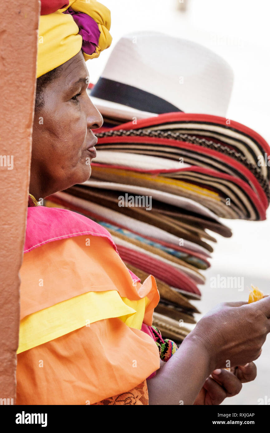 Cartagena Colombia,Black Blacks African Africans ethnic minority,Afro Caribbean Palenquera,adult adults woman women female lady,hat vendor,traditional Stock Photo