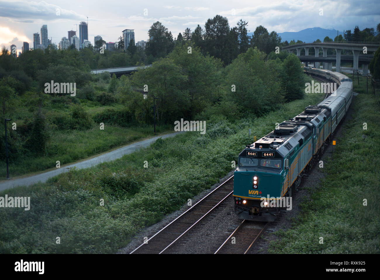 The VIA Rail Canadian train through Burnaby, British Columbia, Canada. Stock Photo