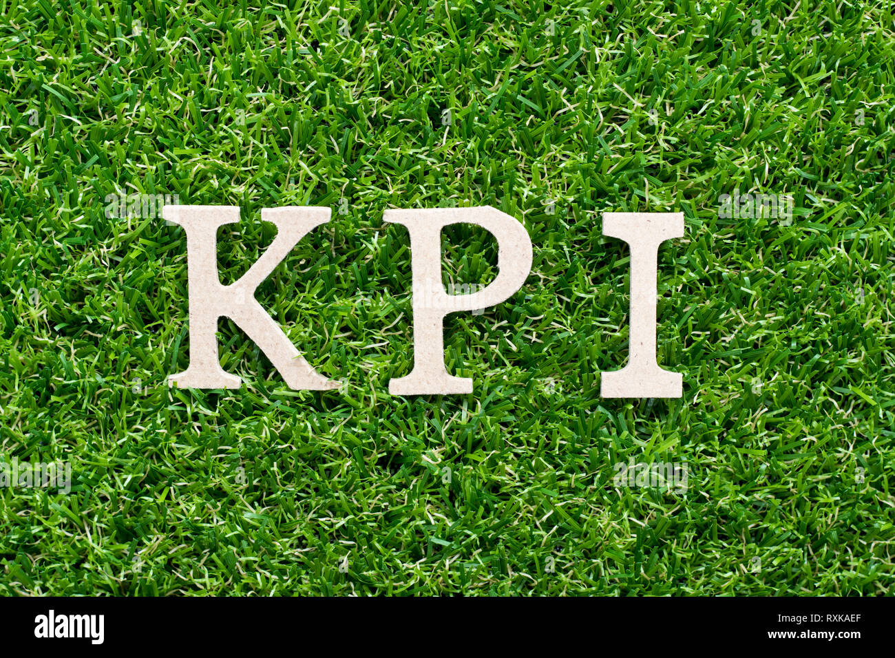 Wood alphabet in word KPI (Abbreviation of key performance indicator