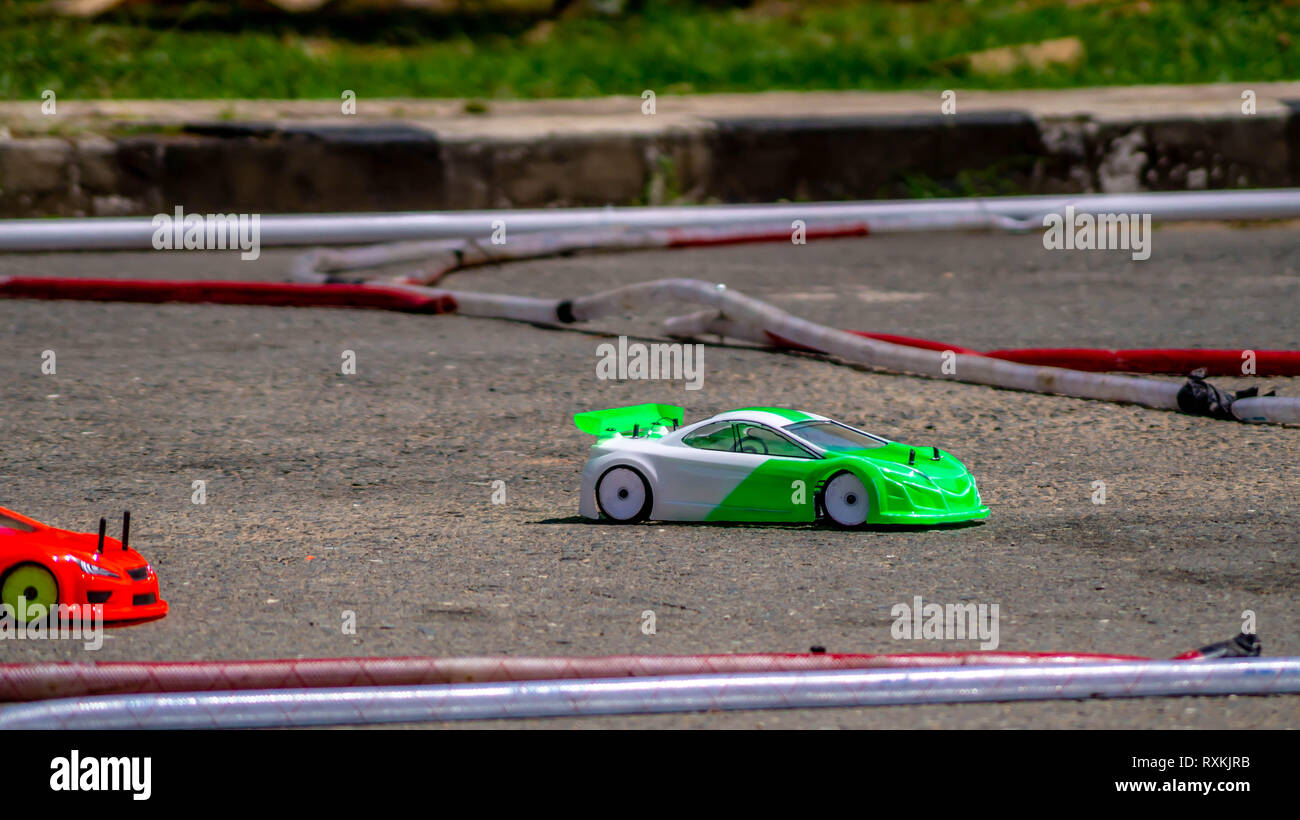 remote control car race competition on tarmac circuit Stock Photo Alamy