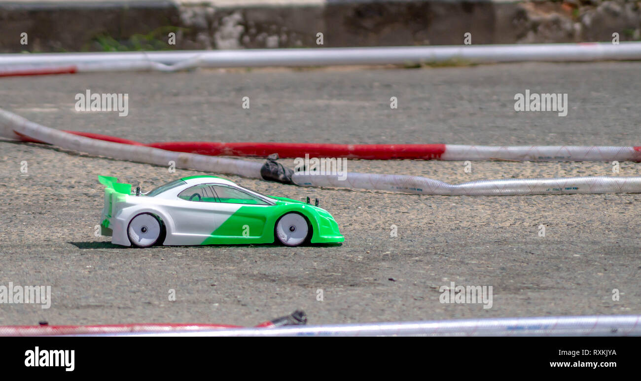 remote control car race competition on tarmac circuit Stock Photo - Alamy