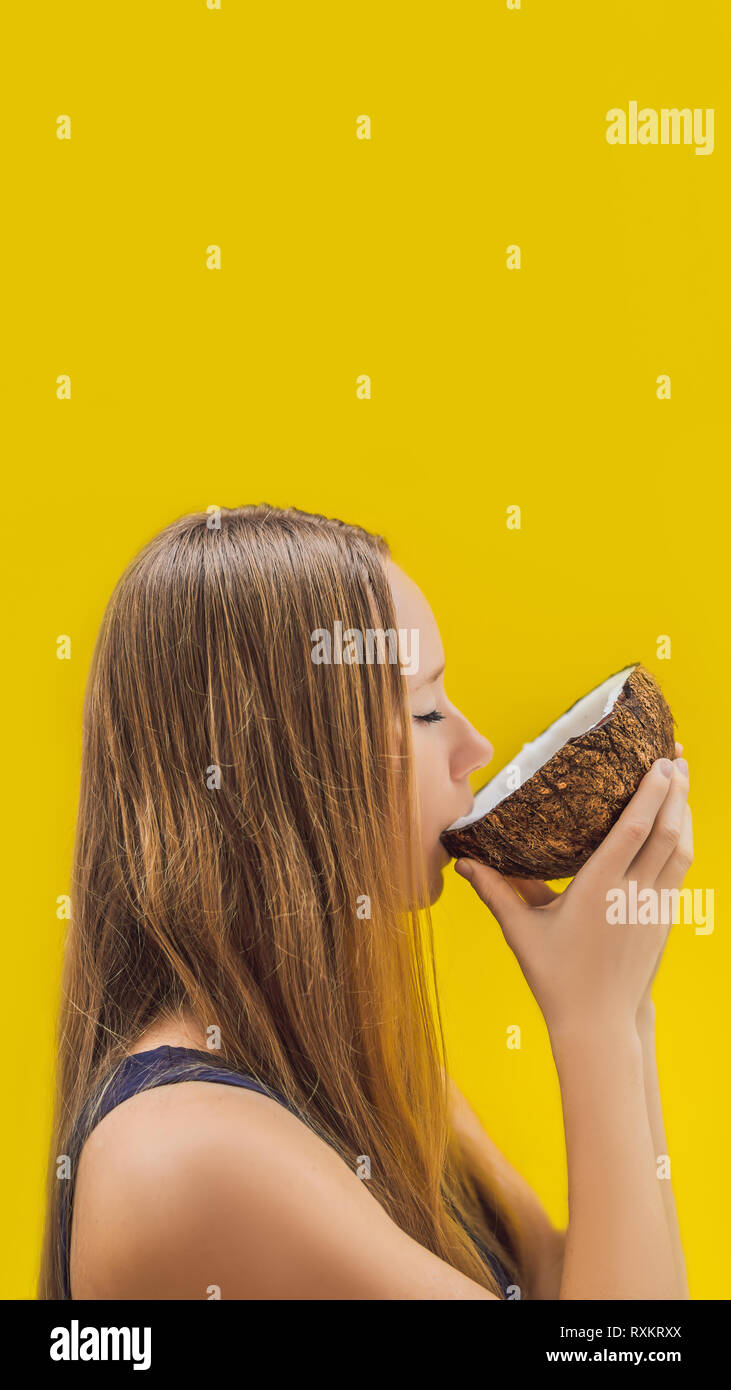 Young Woman Doing Oil Pulling Over Yellow Background Vertical