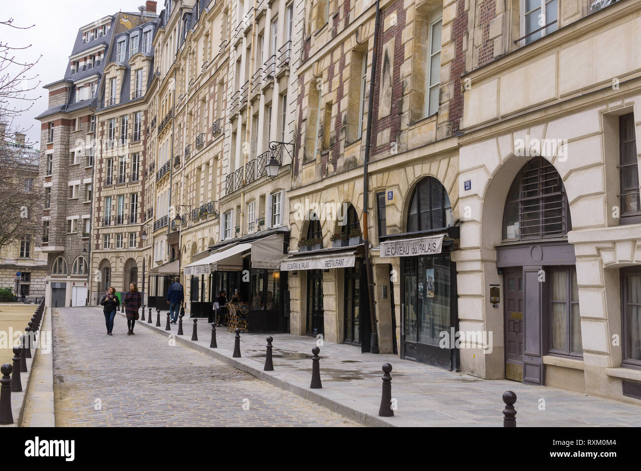 Place Dauphine is a square located on the Ile de la Cite in Paris, France. Stock Photo