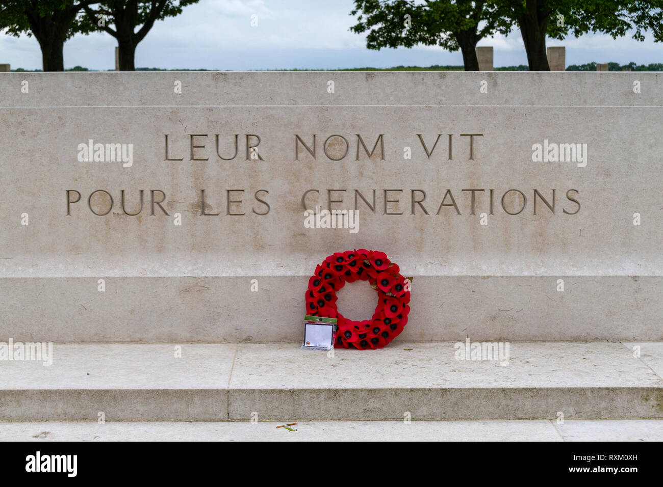 Remembrance Stone (with French inscription Leur Nom Vit Pour Les Generations), Beny-Sur-Mer Canadian Commonwealth Cemetery, Normandy, France. Stock Photo