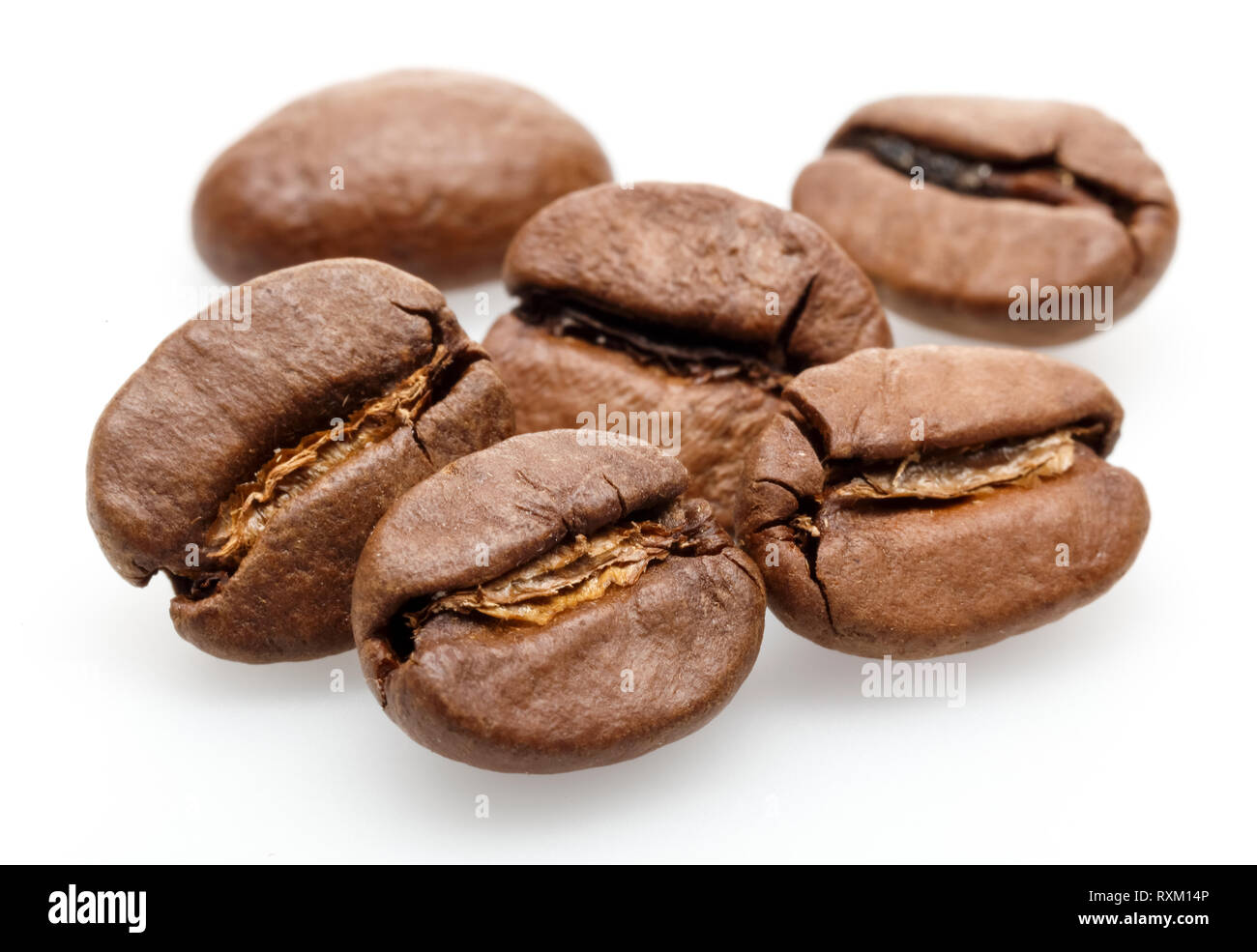 Roasted coffee beans isolated on white background Stock Photo - Alamy