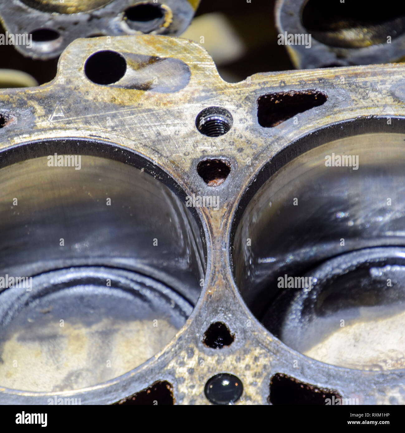 The cylinder block of the fourcylinder engine. Disassembled motor