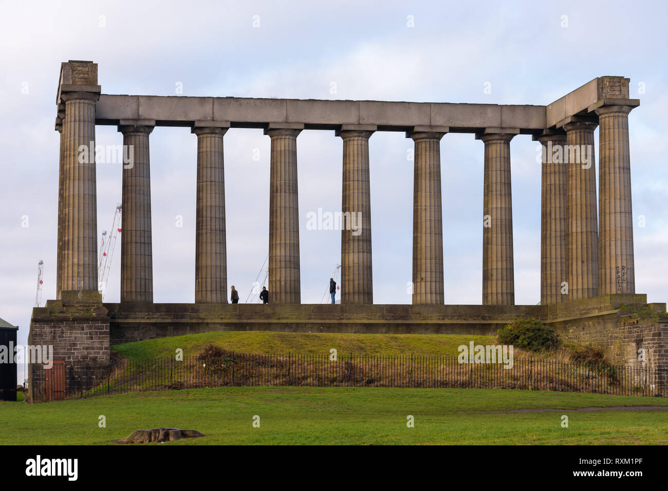 View of the National Monument of Scotland, Historical hilltop memorial to soldiers and sailors from Scotland who perished in the Napoleonic Wars. Stock Photo
