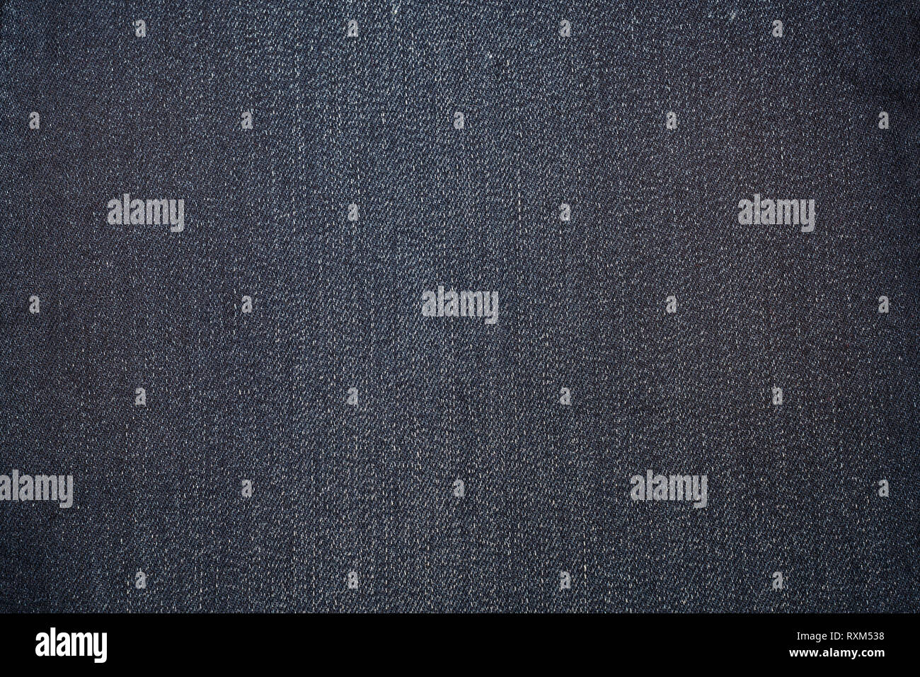 Dark blue texture of denim or blue jeans background Stock Photo
