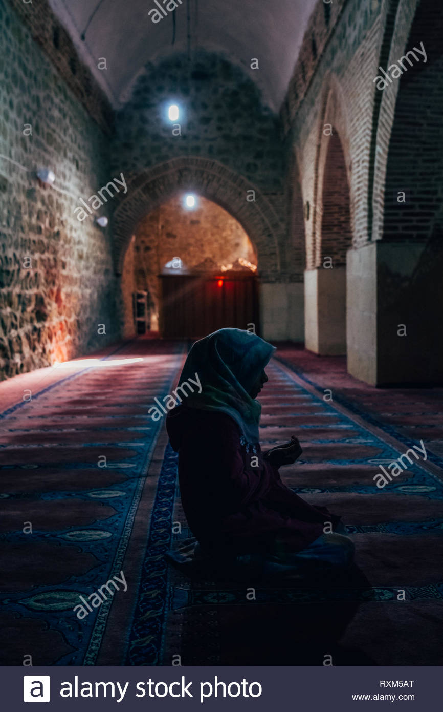 Muslim Little Girl Praying In Mosque Stock Photo Alamy