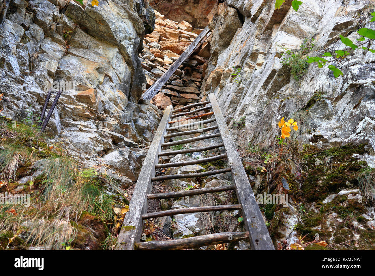 LEUKERBAD, VALAIS, SWITZERLAND - OCTOBER 11, 2018: The dramatic Albinen ladders. Historical trade route between the villages of Albinen and Leukerbad Stock Photo