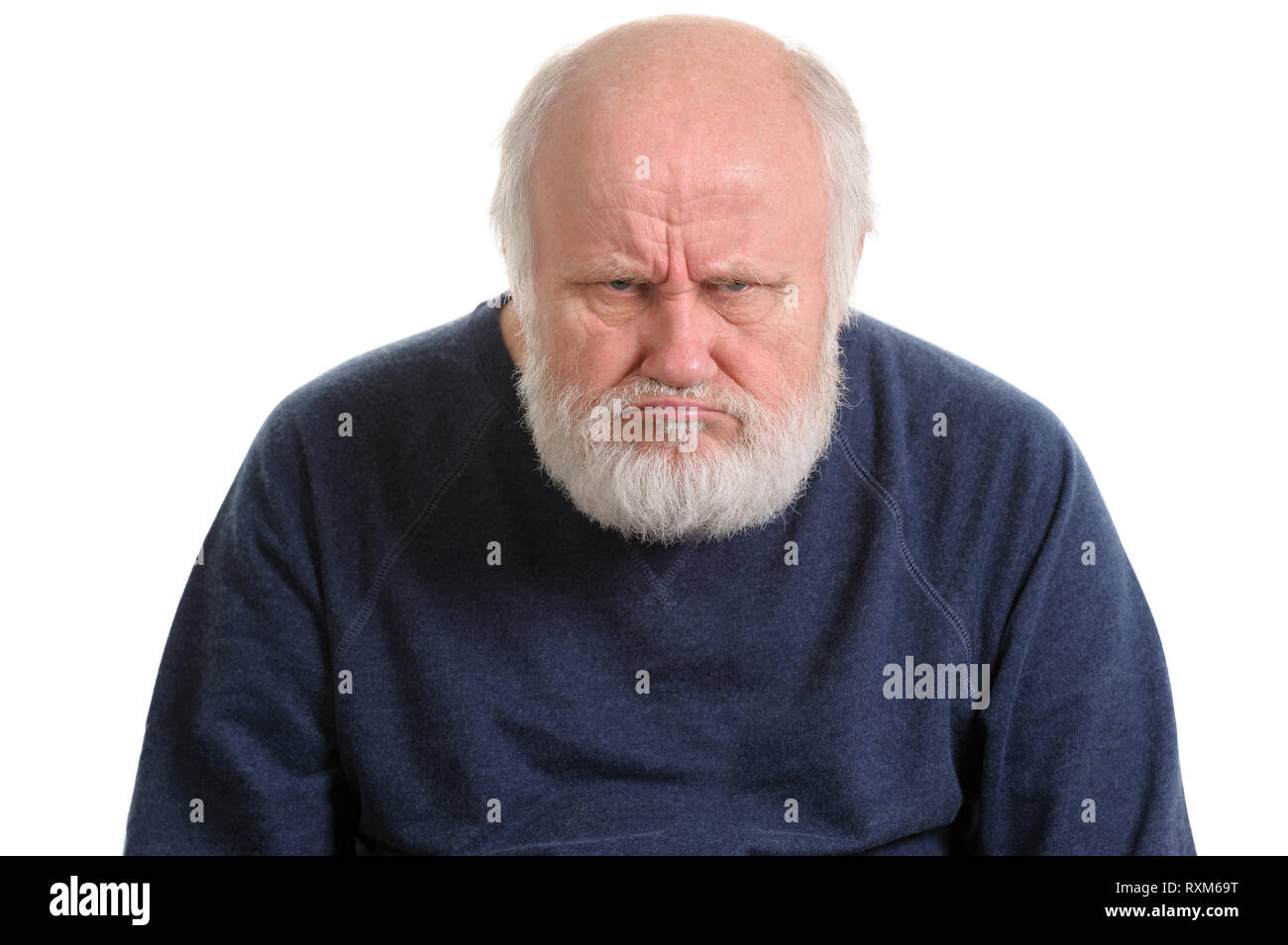 grumpy oldfart or dissatisfied displeased old man isolated portrait Stock Photo