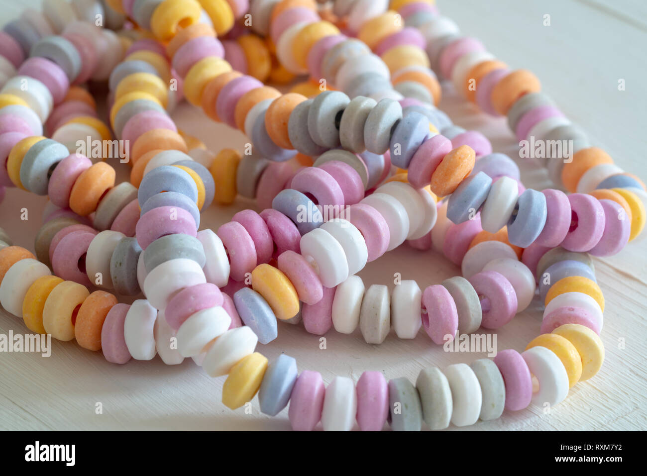 sweets Beads and bracelets candy on a white background Stock Photo - Alamy