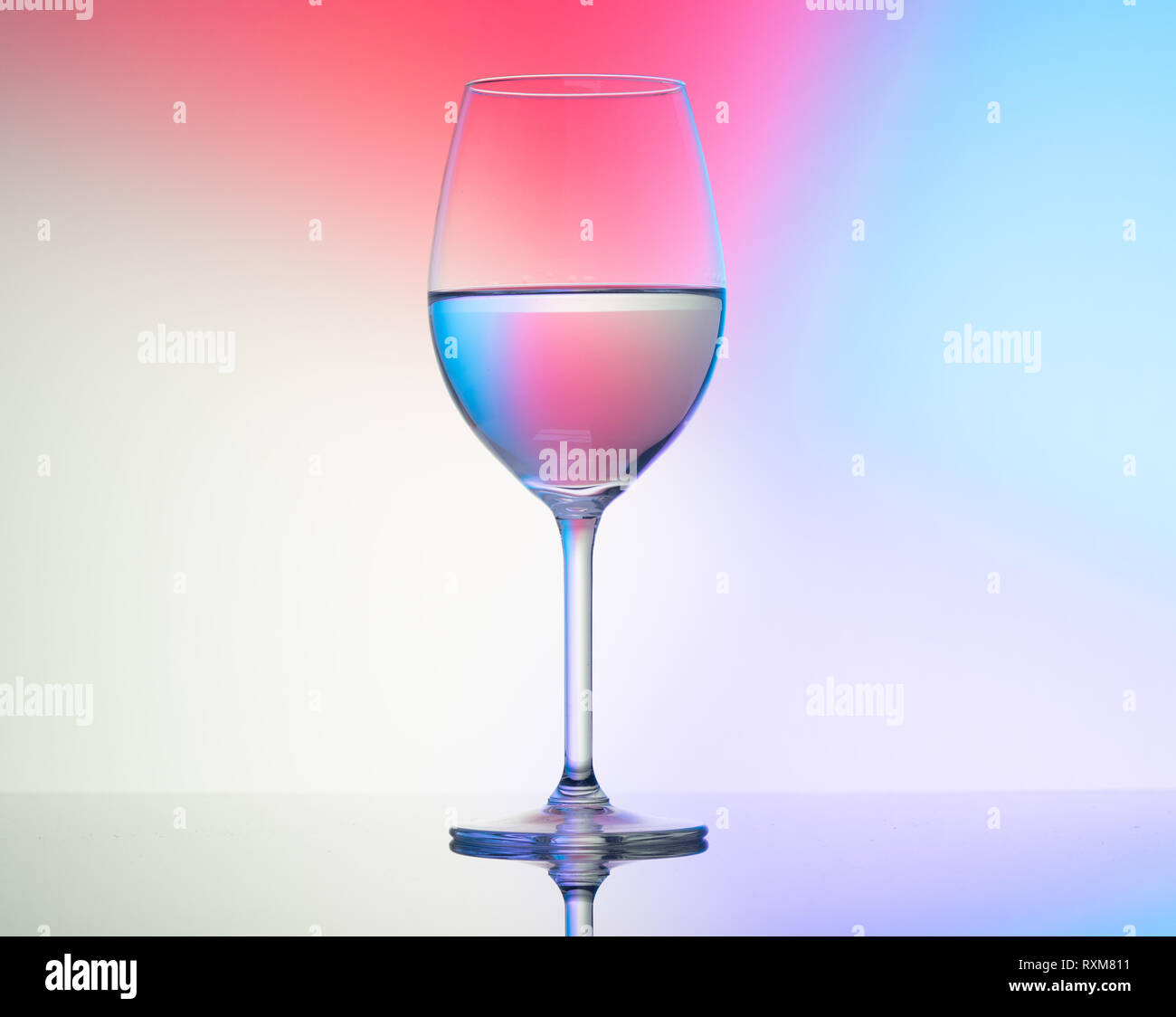 wine glasses dishes on a colored background Stock Photo