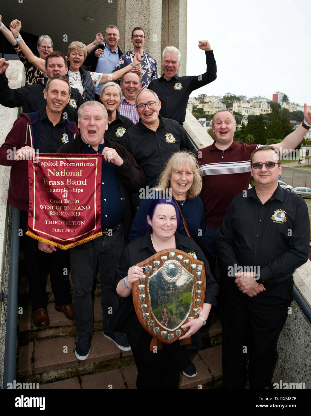 Gosport Solent Brass. Win the 3rd Section South West Region Brass Band Championship 2019. Winning salute and trophy. Stock Photo