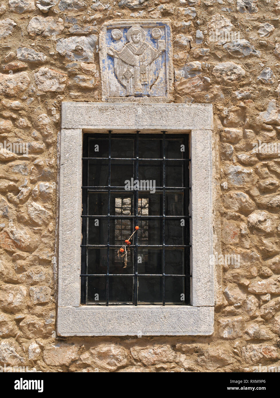 Old window secured with metal bars on stone wall Stock Photo - Alamy