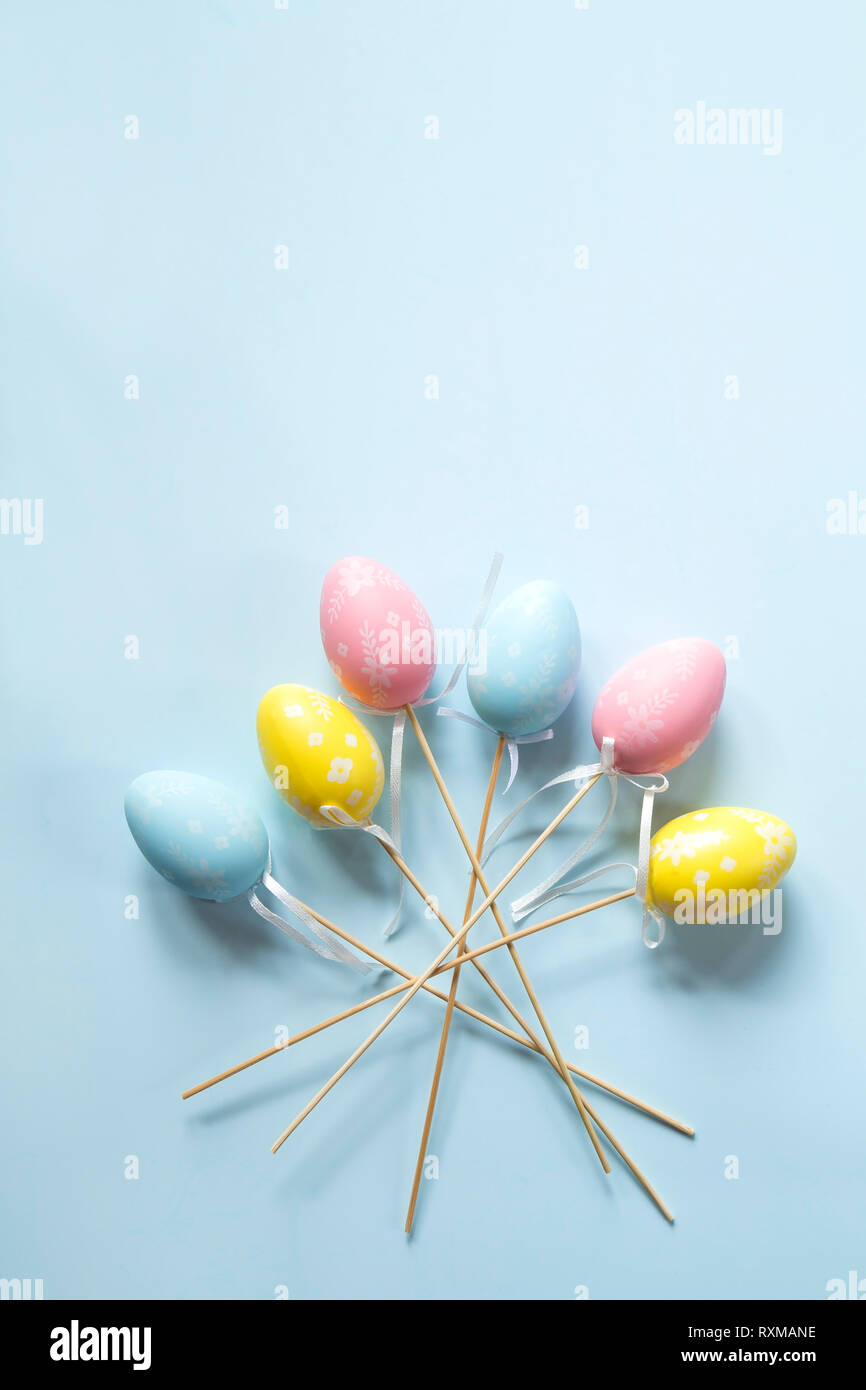 Colorful Easter eggs on blue background Stock Photo