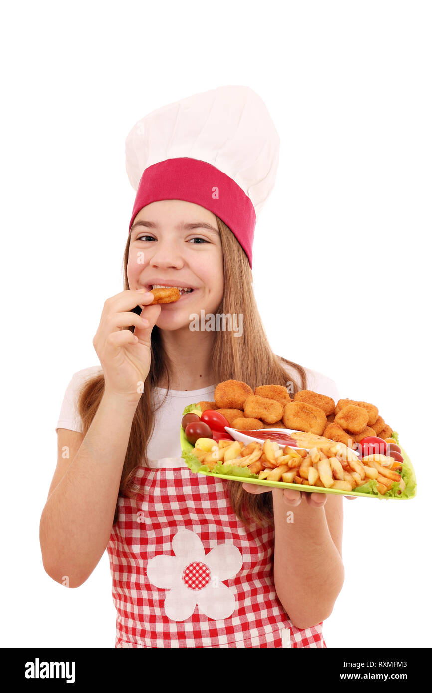 girl cook eats chicken nuggets fast food Stock Photo