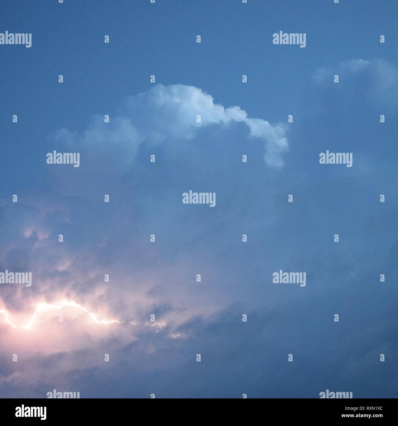 Lightnings in storm clouds. Peals of a thunder and the sparkling ...