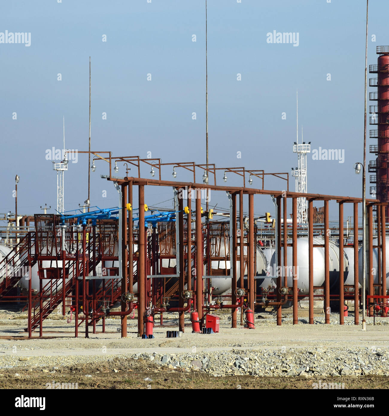 Overpass loading of oil products and fuel storage vessels. The equipment at the refinery. Stock Photo