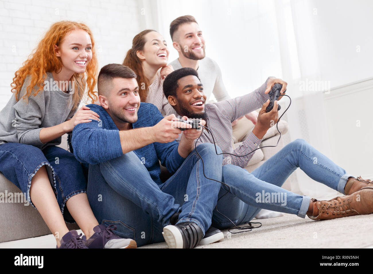 Premium Photo  Excited gamers friends playing video games at home