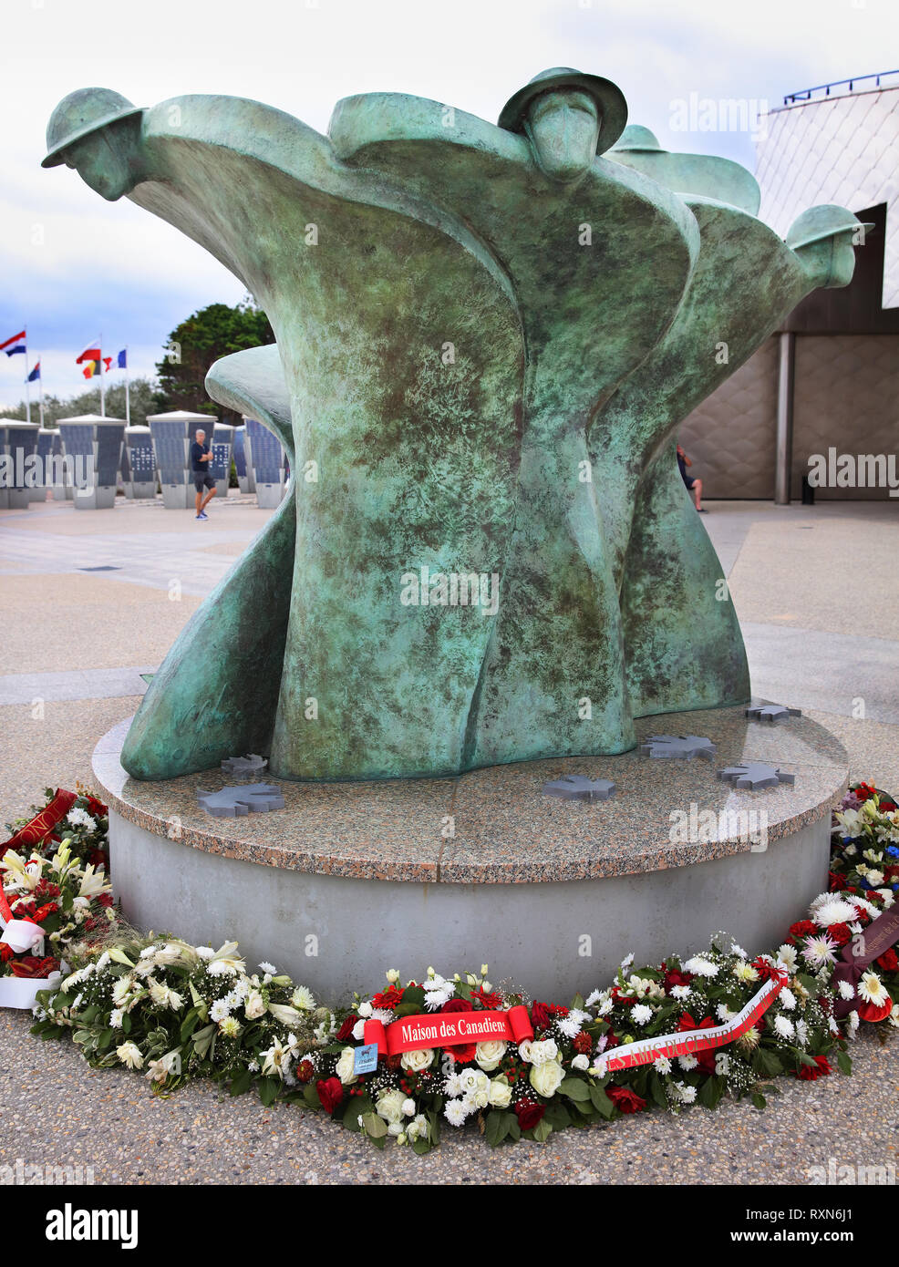 Bronze sculpture by Colin Gibson entitled 'Remembrance and Renewal' in front of the Juno Beach Centre, Courseulles-sur-Mer, Normandy, France Stock Photo